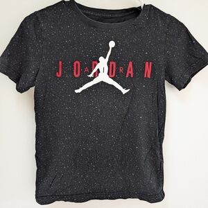 NWOT - Jordan Kids Black Tee with Red Logo. Speckled Design Kids Medium (10-12)